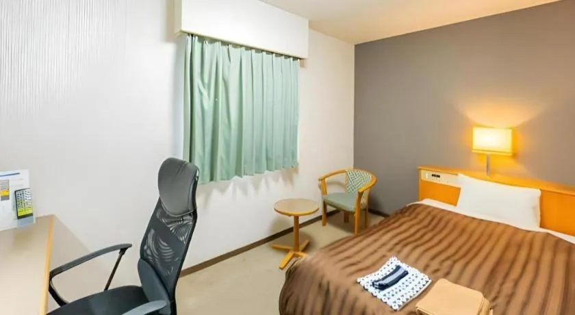 Bed in Mimatsu Hotel