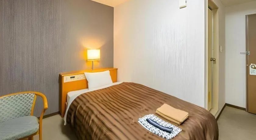 Bed in Mimatsu Hotel