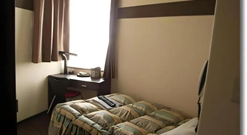 Bed in Mimatsu Hotel