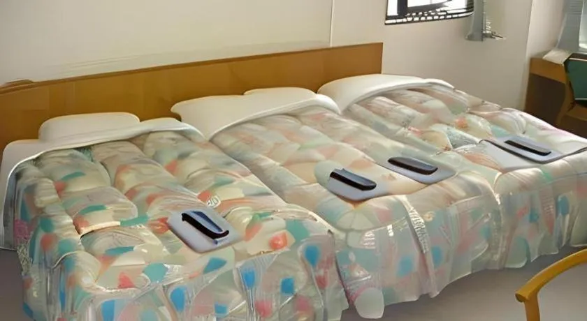 Bed in Mimatsu Hotel