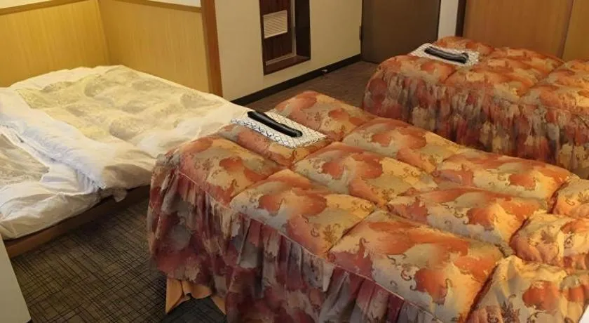 Bed in Mimatsu Hotel