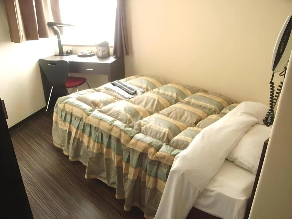 Bed in Mimatsu Hotel