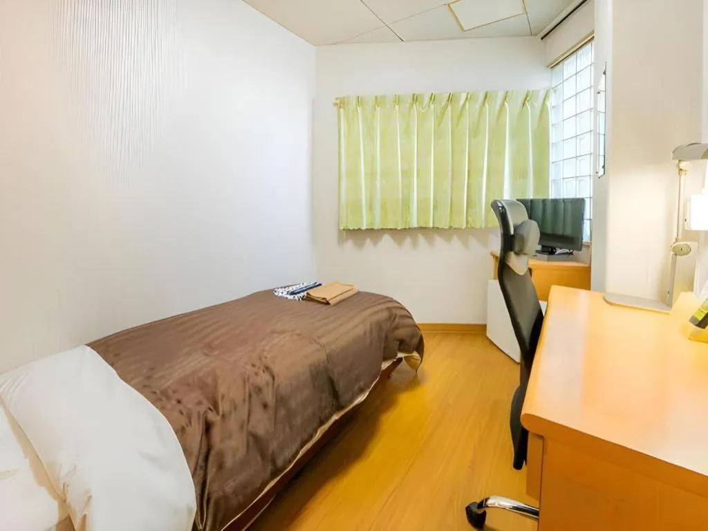 Bed in Mimatsu Hotel