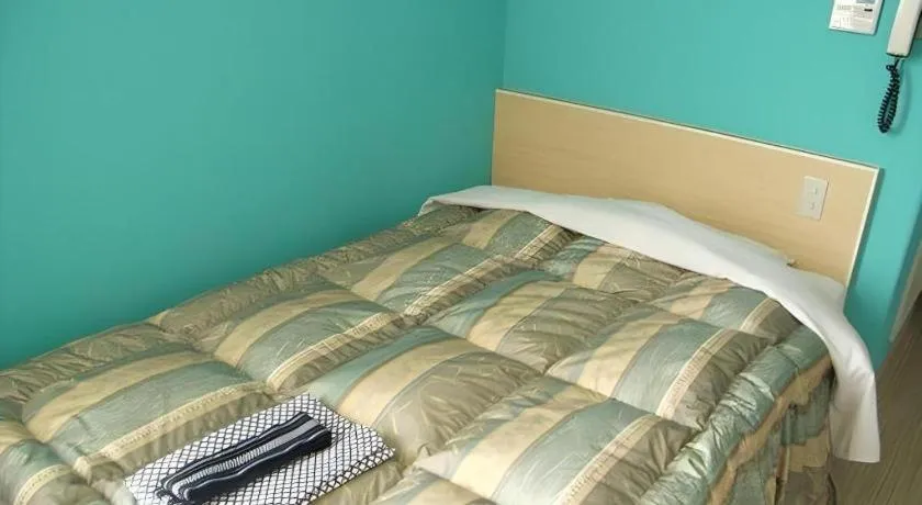 Bed in Mimatsu Hotel