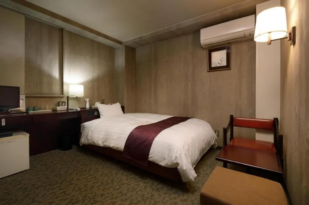 Bed in Ueda Plaza Hotel