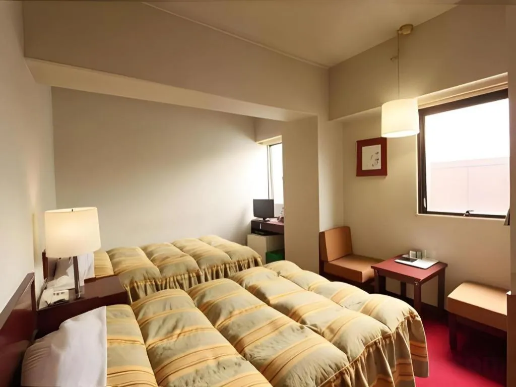 Bed in Ueda Plaza Hotel