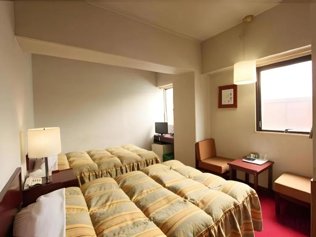 Bed in Ueda Plaza Hotel