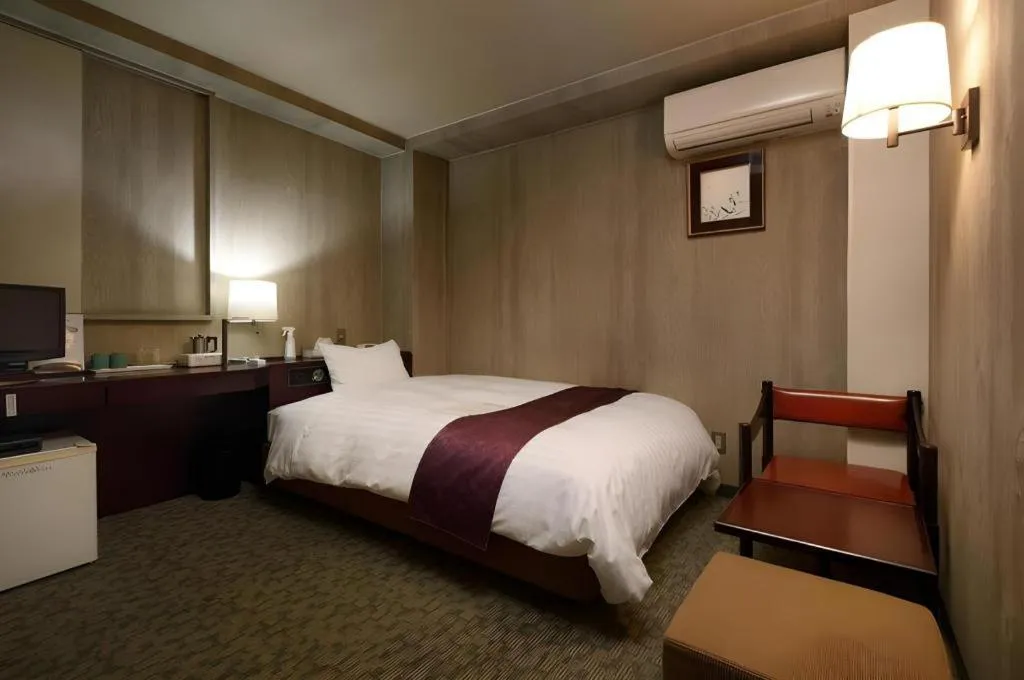 Bed in Ueda Plaza Hotel