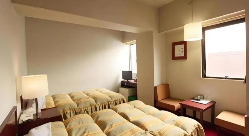 Bed in Ueda Plaza Hotel