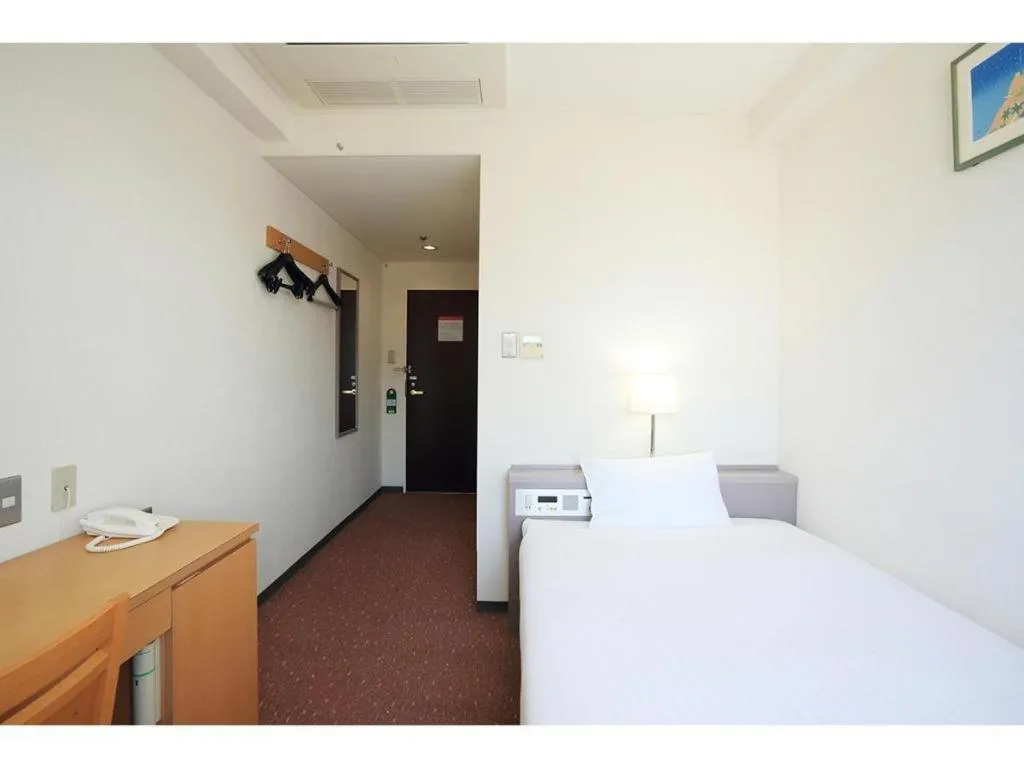 Bed in Smile Hotel Hirosaki