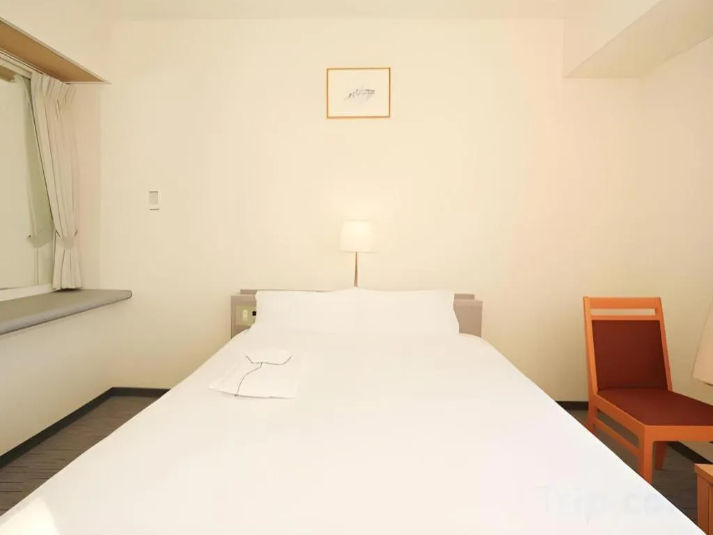 Bed in Smile Hotel Hirosaki