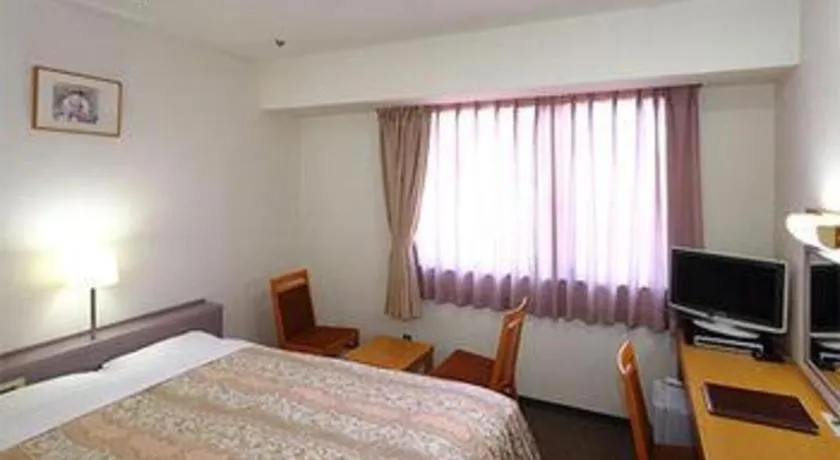 Bed in Smile Hotel Hirosaki