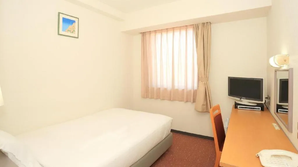 Bed in Smile Hotel Hirosaki