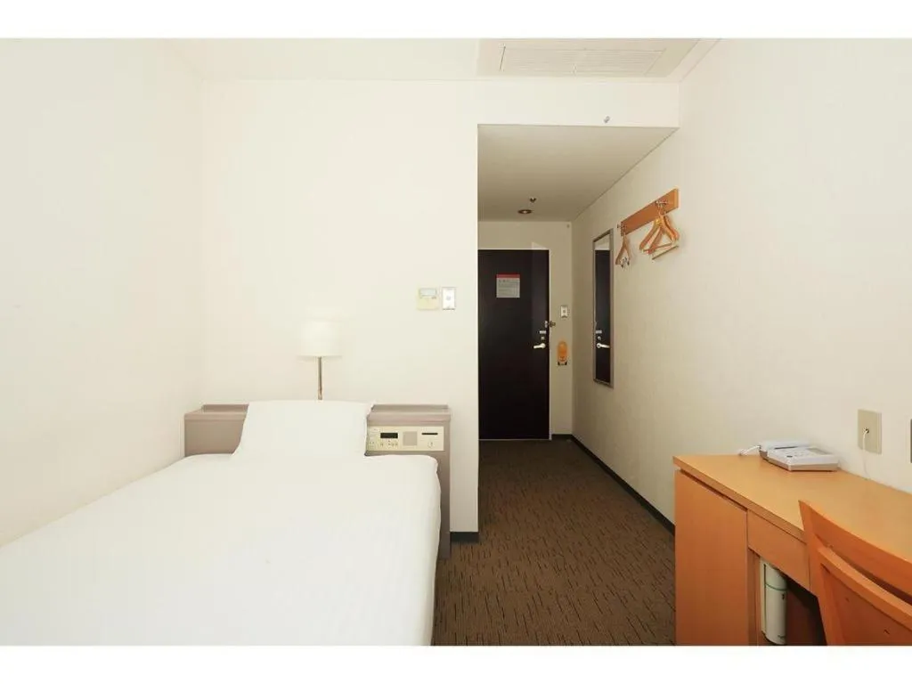 Bed in Smile Hotel Hirosaki