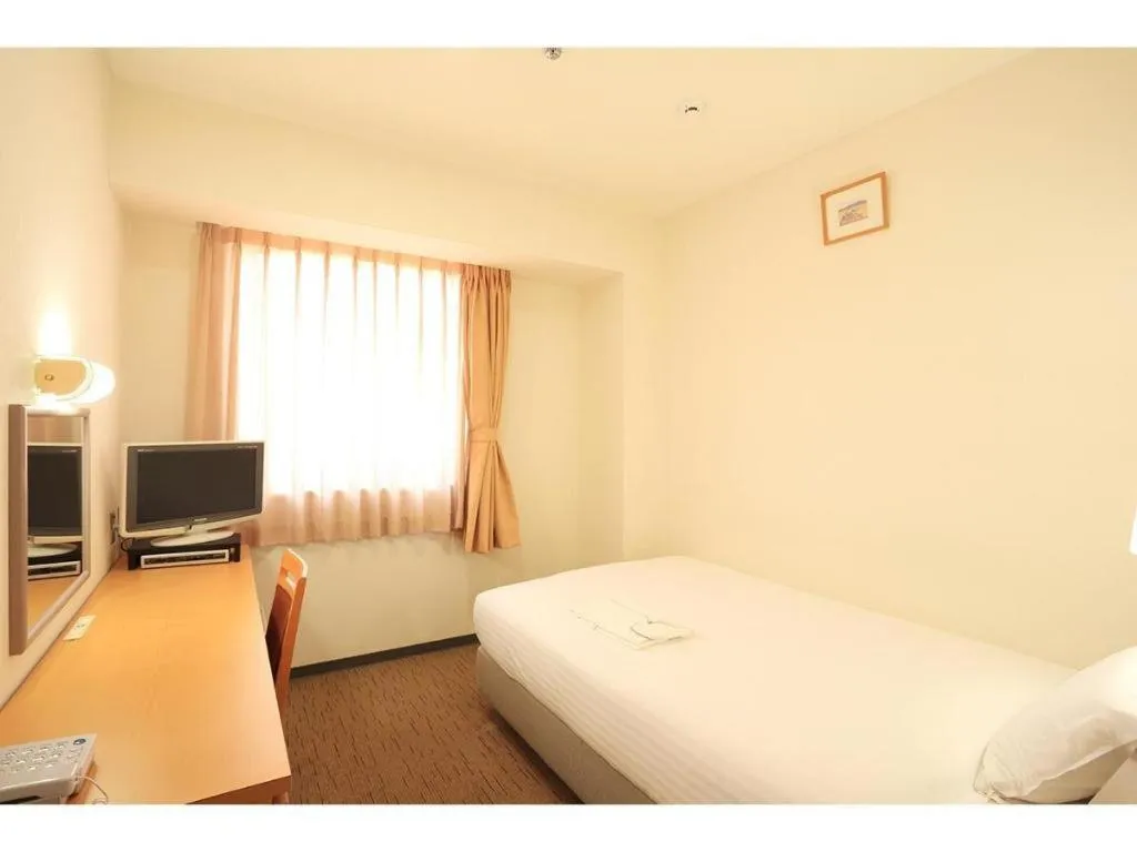 Bed in Smile Hotel Hirosaki