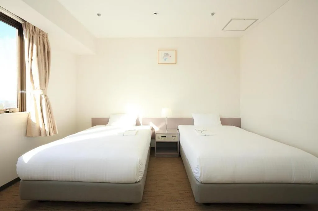 Bed in Smile Hotel Hirosaki