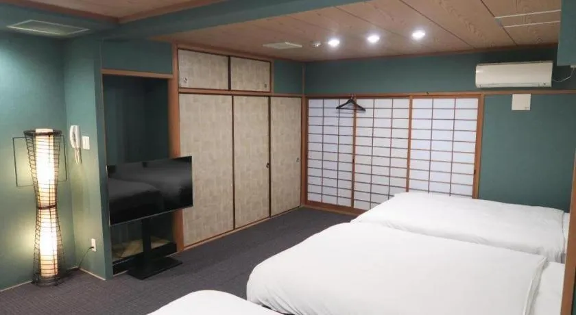 Bed in Rozy Hotel Namba