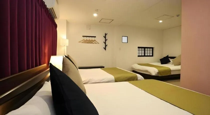 Bed in Rozy Hotel Namba