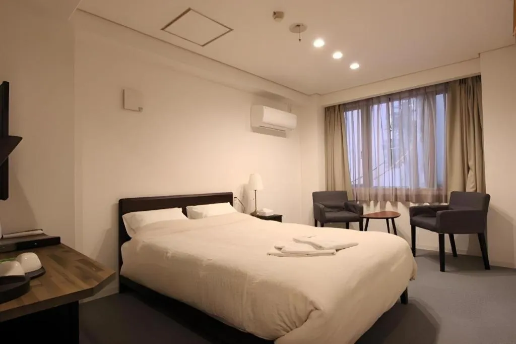 Bed in Rozy Hotel Namba