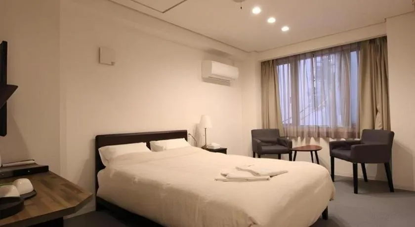 Bed in Rozy Hotel Namba
