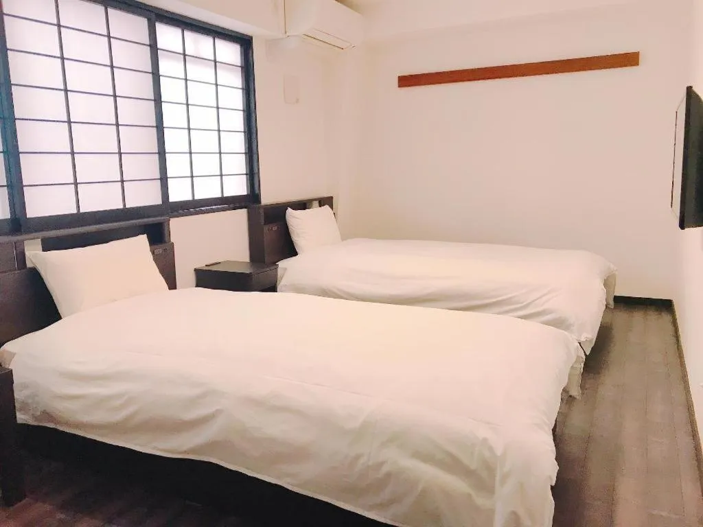 Bed in Rozy Hotel Namba