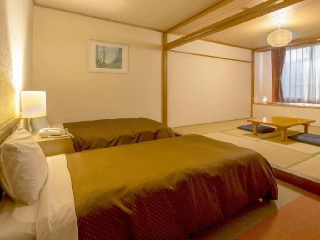 Bed in Washigatake Kogen Hotel Rainbow