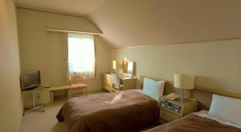 Bed in Washigatake Kogen Hotel Rainbow