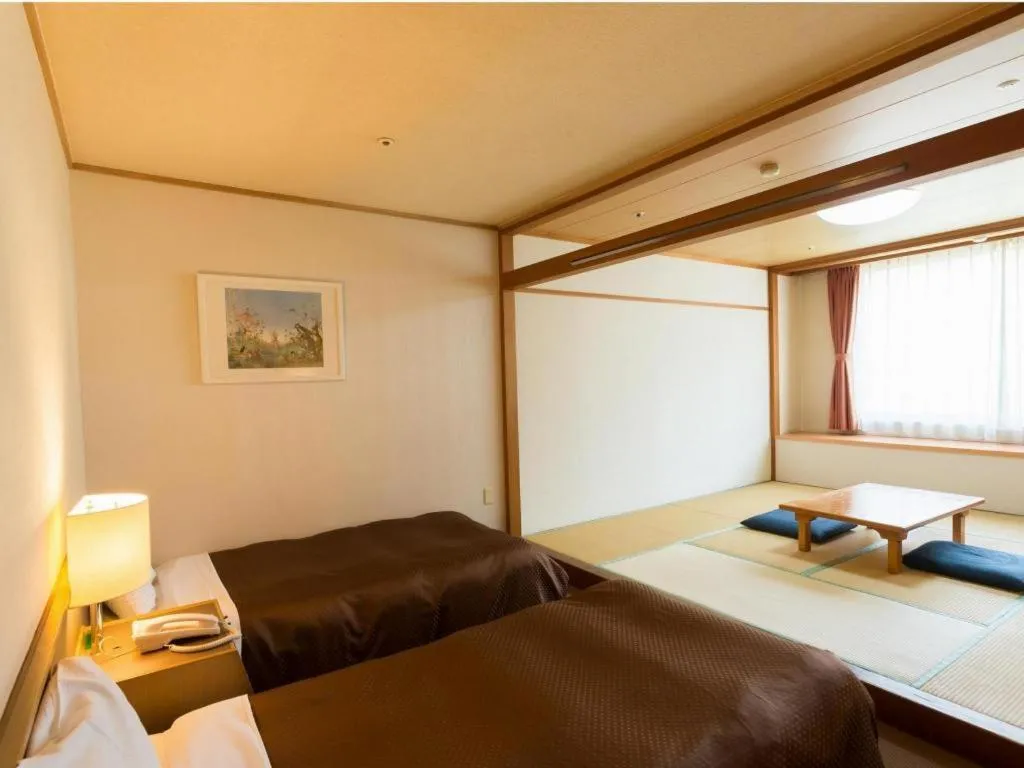 Bed in Washigatake Kogen Hotel Rainbow