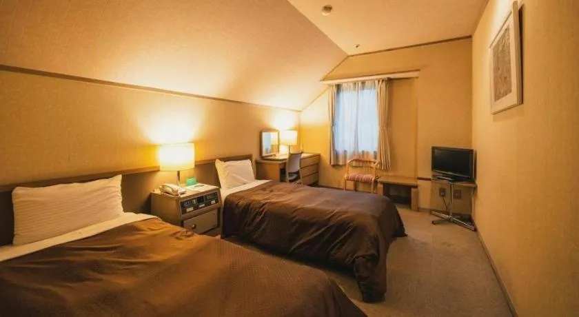 Bed in Washigatake Kogen Hotel Rainbow