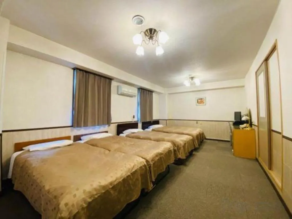 Bed in Fuji Park Hotel