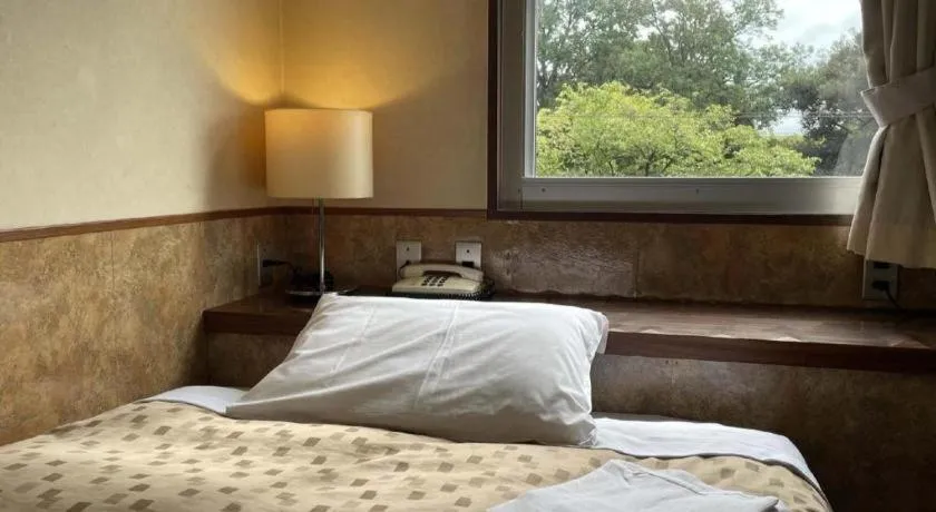 Bed in Fuji Park Hotel