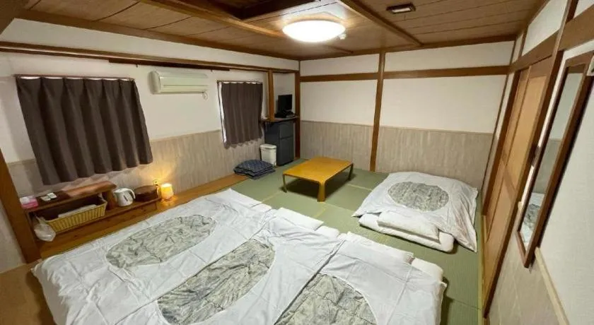 Bed in Fuji Park Hotel