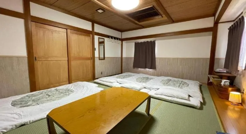 Bed in Fuji Park Hotel