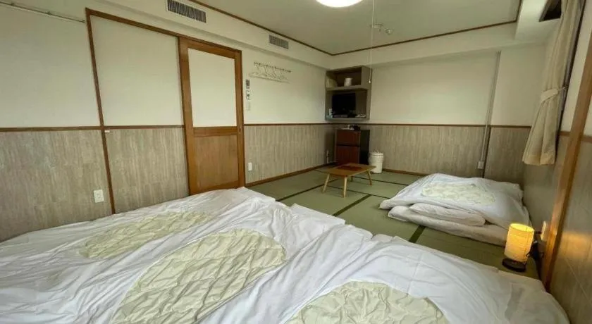 Bed in Fuji Park Hotel