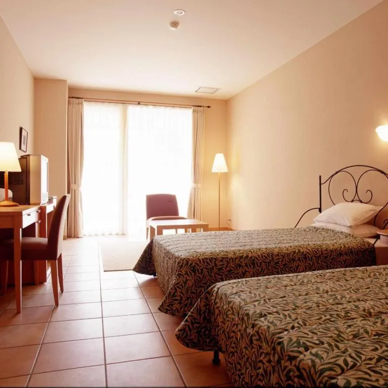 Bed in Sea Side Villa Bokkai