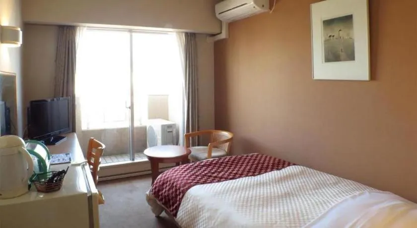 Bed in Hotel Tenchikaku