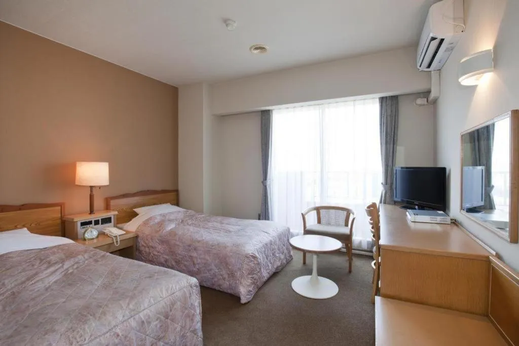 Bed in Hotel Tenchikaku