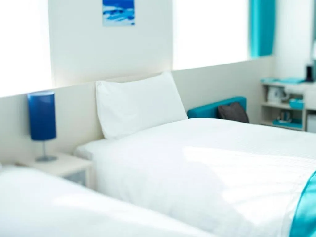 Bed in Daiwa Roynet Hotel OSAKA-SHIN UMEDA ANNEX