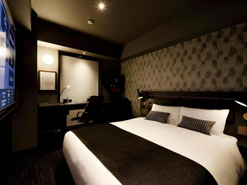 Bed in Daiwa Roynet Hotel OSAKA-SHIN UMEDA ANNEX