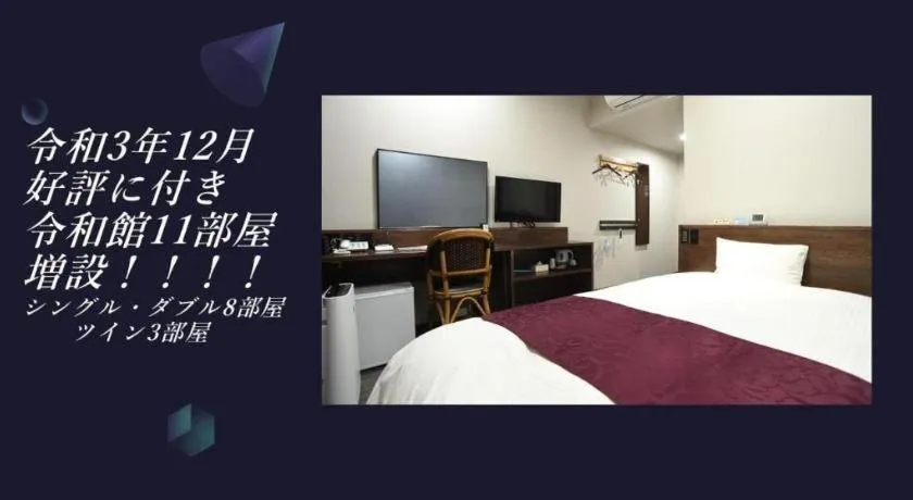 Bed in AKISAWA HOTEL