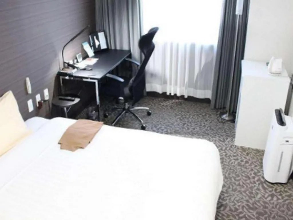 Bed in Hotel Sunshine Iwaki