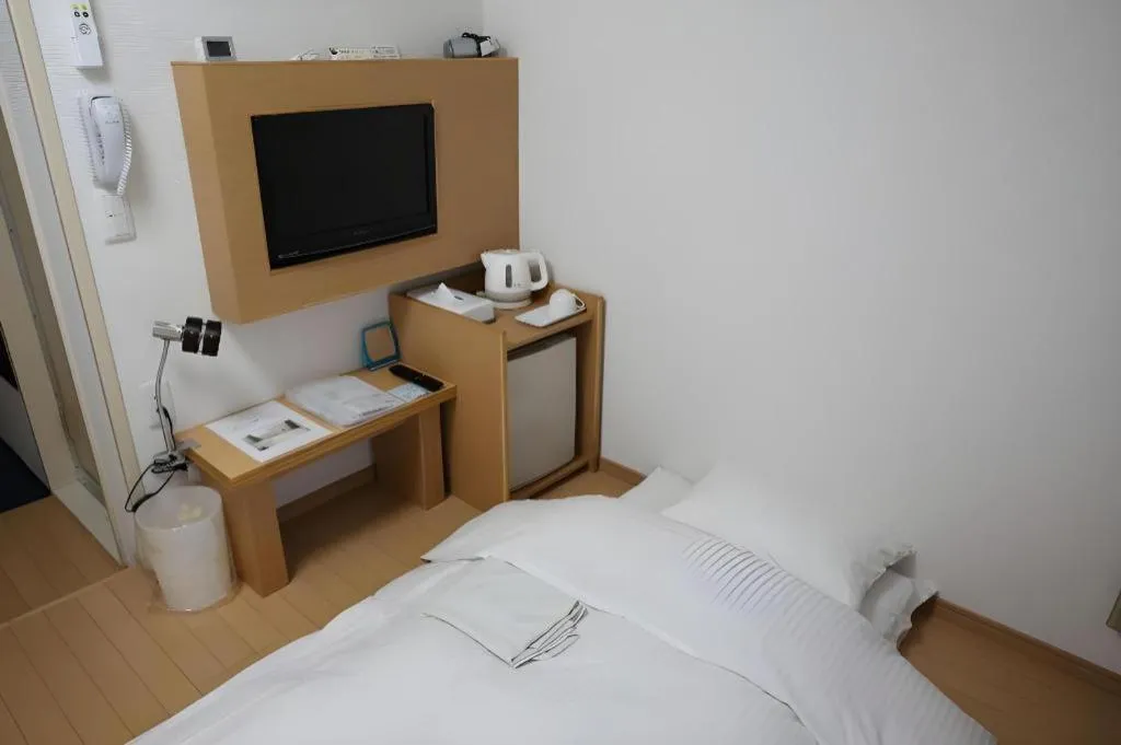 Bed in Hotel Sunshine Iwaki