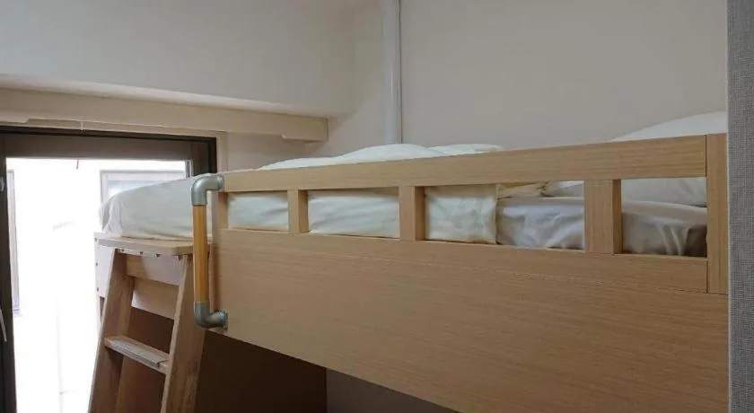 Bed in Hotel Sunshine Iwaki