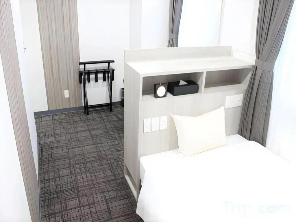 Bed in Hotel Sunshine Iwaki