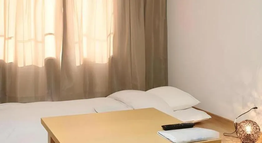 Bed in Hotel Sunshine Iwaki