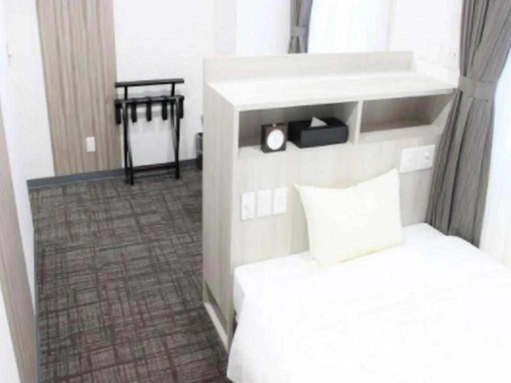 Bed in Hotel Sunshine Iwaki