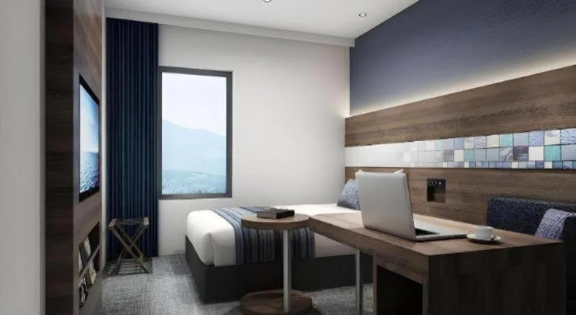 Bed in Goto Tsubaki Hotel