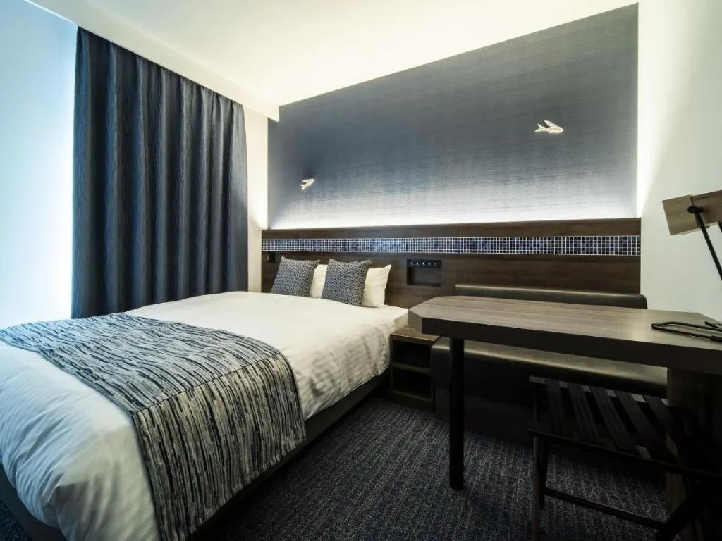 Bed in Goto Tsubaki Hotel