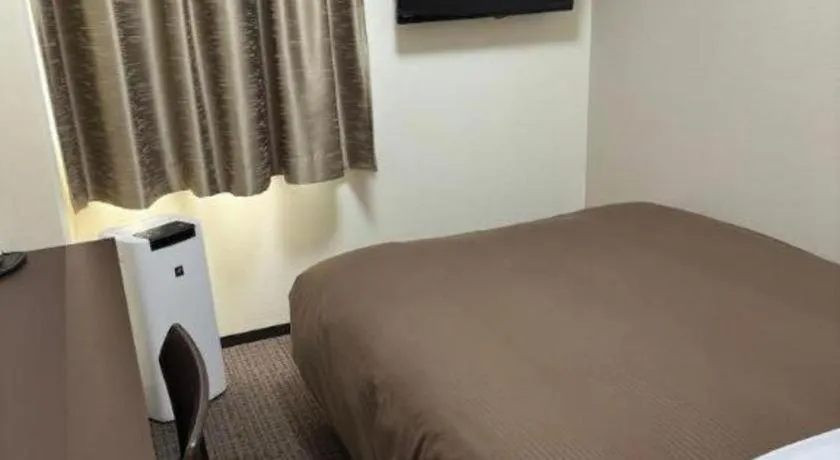 Bed in E Hotel Kumagaya Annex