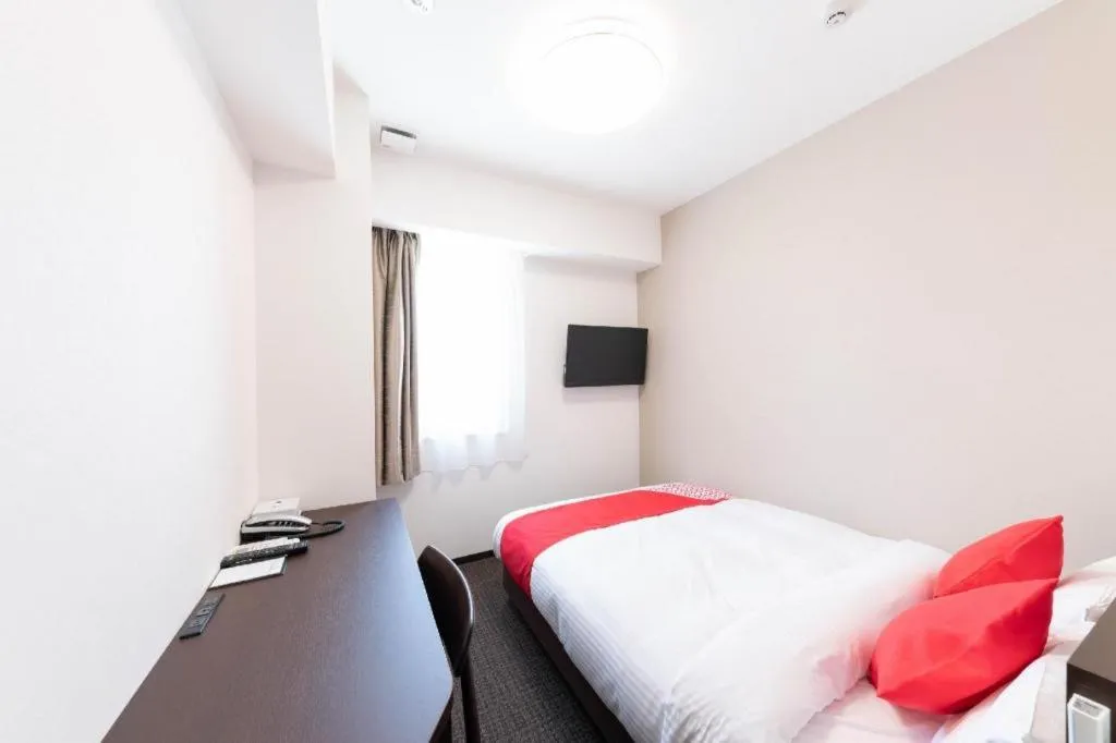Bed in E Hotel Kumagaya Annex